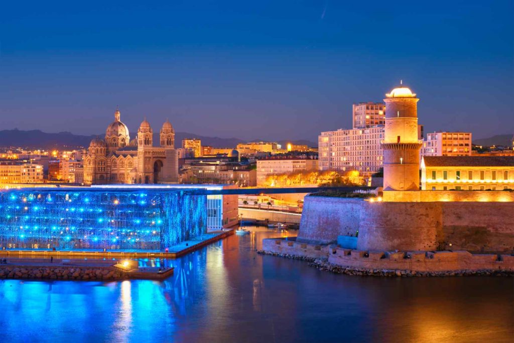 Marseille Old Port and Fort Saint-Jean in night.