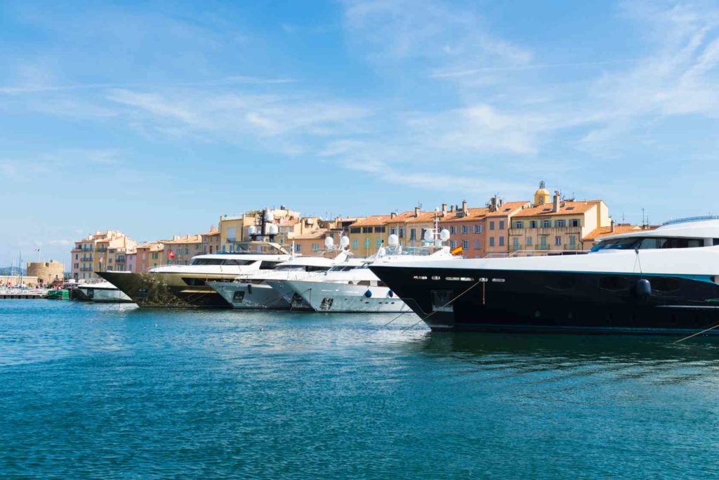 Superyachts moored on waterfront, St Tropez, Cote d'Azur, France

